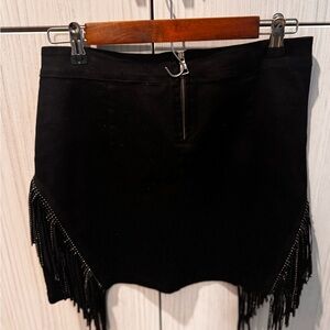 Black denim skirt. Festival ready. Never worn.